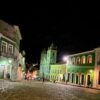 Mergulhe na atmosfera mágica do Pelourinho Iluminado em um tour noturno repleto de religiosidade e cultura afro-católica